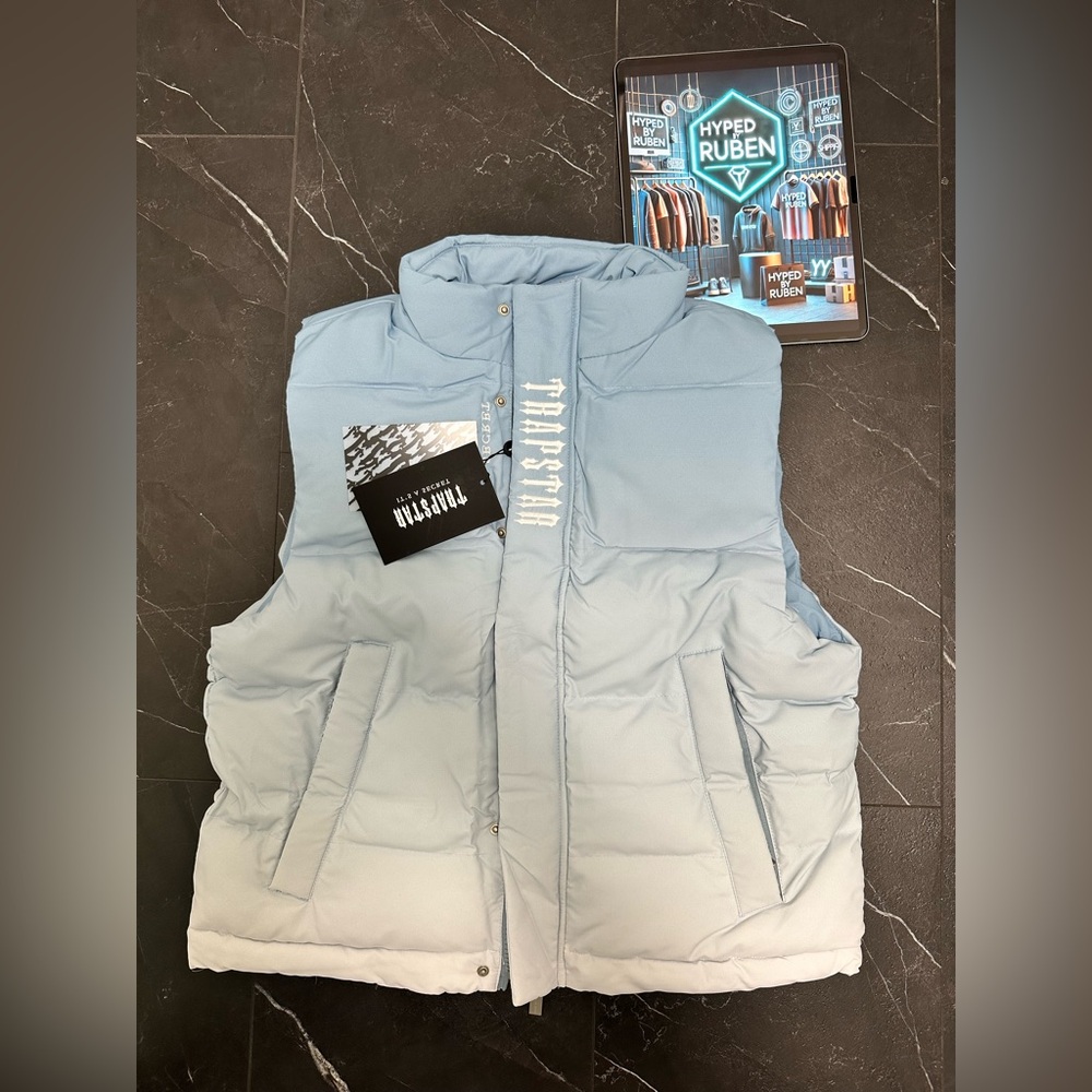 TRAPSTAR DECODED GILET BLUE GRADIENT 
with tags and packaging 
Size M
